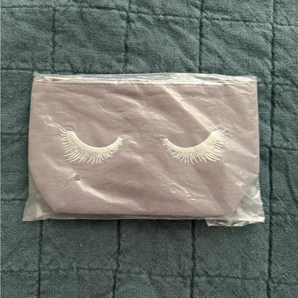 Purple Cosmetic Bag with Decorative Design and Flap Closure